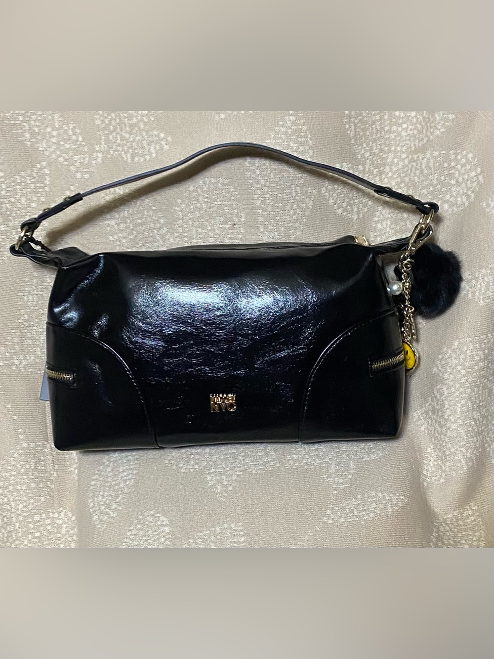 Madden NYC black faux leather shoulder bag with charms